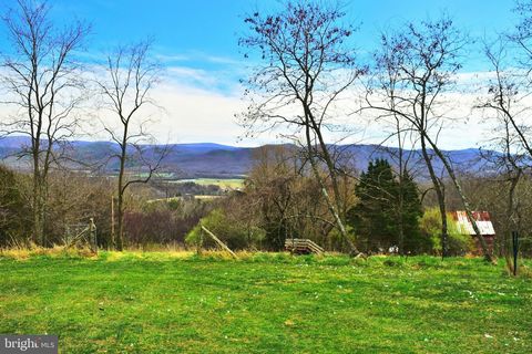 Come and see the unparalleled views and beautiful potential home sites this property has to offer! If you are looking to build your dream house or just a place to come and unwind in nature, this outstanding Sunnyside Rd. property is it! The views are...