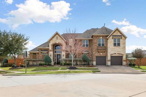 This exquisite Trendmaker home in the esteemed Aliana subdivision is a masterpiece of modern luxury. From its meticulously landscaped corner lot to its soaring ceilings and designer finishes, every detail exudes sophistication. The main level feature...