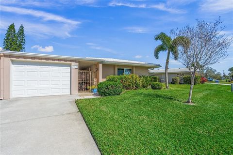 Welcome to this bright and airy 2 bedroom, 2 bath villa that has been exquisitely remodeled in Village Green. As you enter the villa you can immediately feel the Florida lifestyle!! You are greeted by an expansive open floor plan with freshly painted...