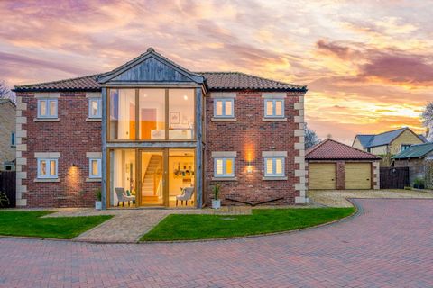 Located within this exclusive development, in the picturesque village of Potterhanworth, this impressive detached family home reveals an interior that is thoughtfully designed and infused with luxurious details, all bathed in natural light. Externall...