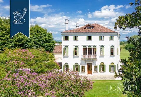 This stunning Venetian villa from the late 1400s is for sale with a barchessa in the leafy Riviera del Brenta, between Venice and Padua. Brought back to its former glory through a skilful restoration which involved the careful recovery of its preciou...