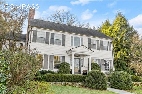 8 Orchard is a stunning classic Colonial thoughtfully redesigned for today's modern buyer. Located steps from the acclaimed Bronxville school, village center and train, the house is sited on over a third of an acre of flat property. Handsome curb app...