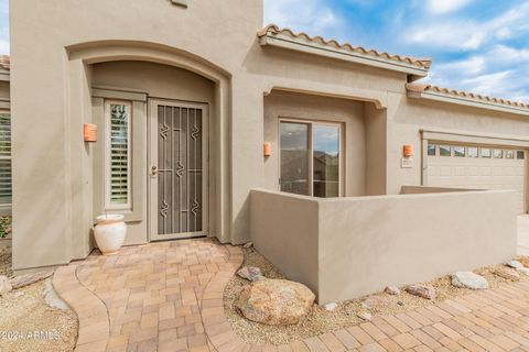 Stunning dual en suite home loaded with upgrades in the McDowell Mountain Ranch gated community of Castle Chase. Premium lot with view fencing and magnificent mountain views. This home also has a half bath - very unique at this square footage! The la...