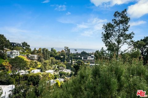Welcome to this stunning 3 bedroom 3 bathroom Mid-Century home nestled in one of Los Angeles' most prestigious neighborhoods, just off upper Doheny. Boasting breathtaking views and a thoughtfully designed floorplan, this residence offers the epitome ...