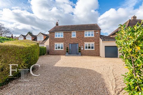 The accommodation comprises of a large entrance door leading to a large reception hall, cloakroom, a large living room with double opening doors to the sitting room that has bifold doors with internal blinds and underfloor heating. Leading from the s...