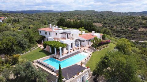 Located in Loulé. This charming well built property nestled on a hill just outside Loulé offers spectacular views to the surrounding country side and distant sea views. A picturesque courtyard with fountain welcomes you on arrival. The large living s...