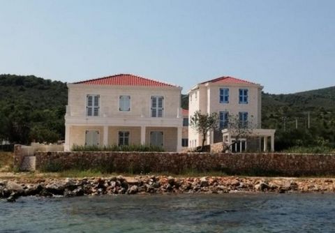 Beachfront new stone villa with swimming pool for sale on one of multiple beautiful islands near Zadar! Private access to the beach! Of the two built villas, one is left for sale. Total area is 200 sq.m. Villa offers grand open-plan space on the grou...