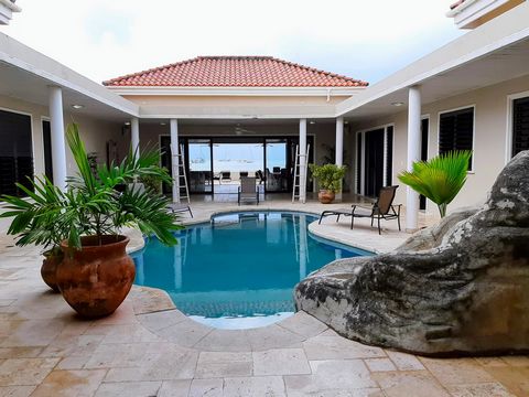 Located in Jolly Harbour. The 441 Beach House is an exceptional luxury property location directly on the beach on the South Finger of Jolly Habour Marina. The views are simply amazing! This lovely vacation property is fully furnished. The open plan l...