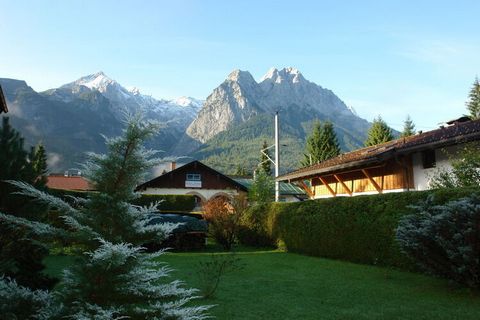 Modern and quiet holiday apartment Traumblick Juna (approx. 60 m²) with one bedroom and fantastic views of the Waxenstein and Zugspitze massifs. The holiday apartment has a sunny south-west terrace of approx. 15 m² in a well-kept garden. The quiet at...