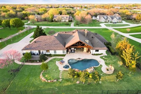 Custom built masterpiece sprawled on almost 2 acres in the heart of Frisco! Exquisite fully remodeled residence with an open living area transitioning into an expansive outdoor living space. Great for entertaining by the sparkling pool, spa, grotto &...