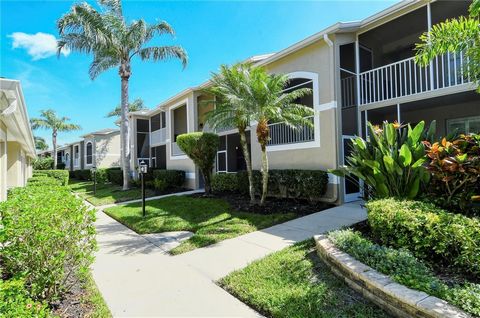 Welcome to Heritage Oaks Golf and Country Club - Sarasota's premiere bundled, gated golfing community. This incredible Barrington model veranda features 2 bedrooms, 2 full bathrooms, and a den/study with a built-in desk wall unit that's perfect as a ...