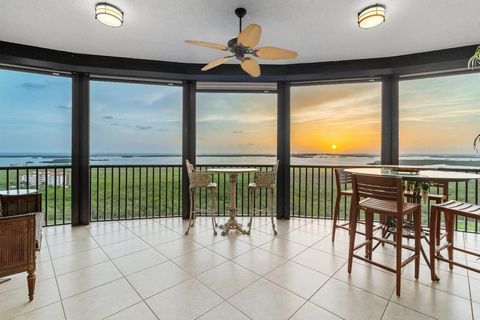 Enjoy 19th floor panoramic sunset views of Estero Bay, the Gulf and sunrises to the East. Views from every room! This home also includes a RARE ENCLOSED PRIVATE 2 CAR GARAGE (Normally reserved for penthouses), 1 of only 4 in the building! Private ele...