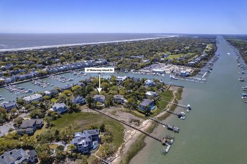 Live your best life with an unrivaled waterfront lifestyle, featuring a shared deepwater dock with your own private boat lift and floater in this breathtaking Intracoastal Waterway residence. The scenery evolves with the shifting tides, complemented ...