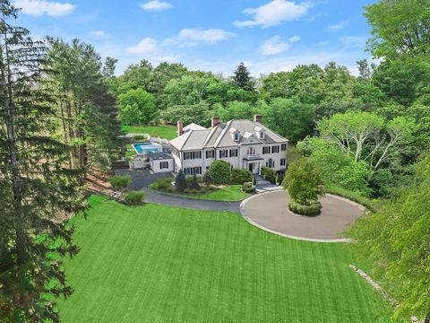 A timeless Connecticut Compound in mid-country Greenwich custom designed and built by a coveted team. Resting on 4.7 private level acres with a two bedroom guest house and barn/accessory garage. The sun-filled stylish interior features 10+foot ceilin...