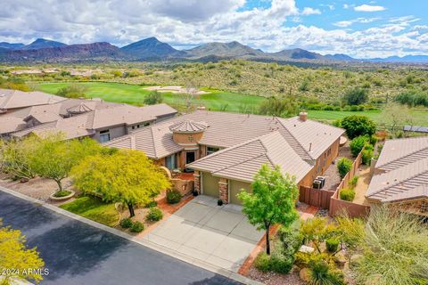 Welcome to your dream home nestled on the 18th hole of the prestigious Ironwood course in Anthem Country Club. This captivating Brentwood model with Casita boasts breathtaking views that extend toward the majestic mountains, providing a serene backdr...