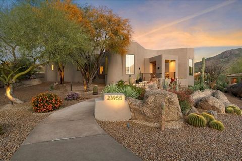 A stunning remodel located in the prestigious gated community of Troon Ridge Estates 3. This newly landscaped corner lot has spectacular views and features resort style living at its best. Every detail has been executed with meticulous attention, bri...