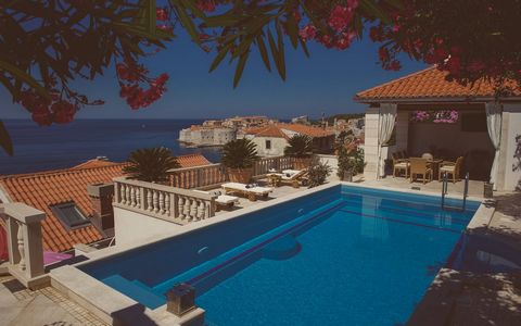 Perched atop a hill overlooking the historic Dubrovnik Old Town, this stunning villa offers a luxurious retreat with breathtaking views of the city center and the sparkling Adriatic Sea. Built in 2005, this majestic property boasts a prime location j...