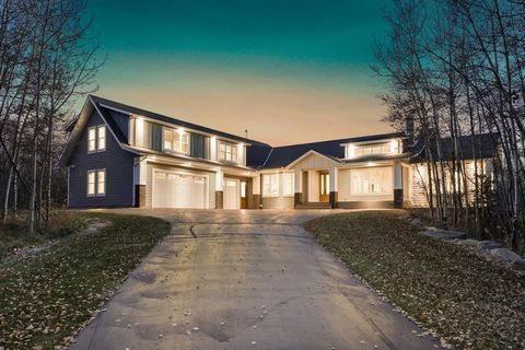 Nestled within 5.14 acres of scenic landscapes minutes from both Calgary and Okotoks, this exquisite 5 bedroom, 4 bath, one-and-a-half-story custom-built modern farmhouse offers an unparalleled private oasis, blending rural tranquility with upscale c...