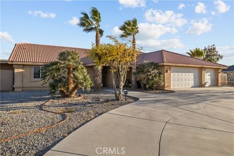 This stunning single-story custom home, situated on a prominent corner lot, combines comfort, style, and practicality. The property is fully fenced with an electric gate for added security and features a spacious three-car garage along with ample par...