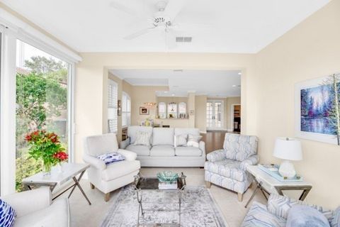 Immaculate Harbor Links home with light bright southern exposure. Lovely neutral palette, fabulous floor plan, master on main, den, impact doors and shutters, gorgeous second floor golf and preserve views. Beautiful chefs kitchen, AC in garage, brick...