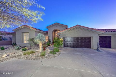 Rare. Immaculate. Priced right. Tucked into the foothills of the picturesque McDowell Mountain Preserve, the 12' ceilings and expansive windows of this 4 bedroom, 4.5 bath, 3 car garage home frame the divine views of the majestic mountains, twinkling...