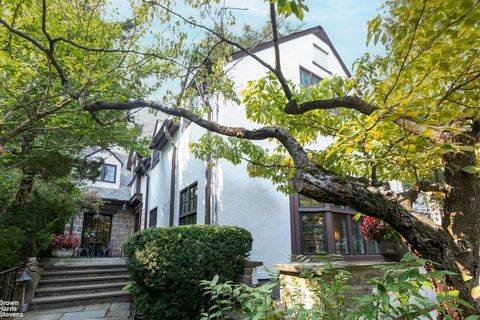 Nestled in the Spuyten Duyvil section of Riverdale, this 1925 classic Tudor home, with beautifully maintained classic architecture, stucco and stone details, casement windows, slate roof, copper roofing over the bay window, and stone detail around th...