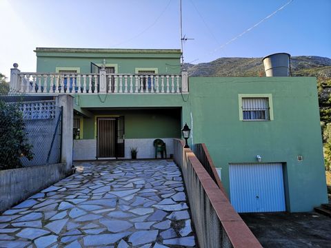 Country house located at the foot of the mountain in the beautiful and wellknown town of Pego with wonderful views of the valley and the sea The fully fenced plot consists of 2430 m2 with a house of 214 m2 built The garden is divided into several are...