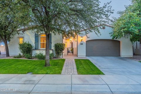 Experience the epitome of luxury living in this stunning single-story Ocotillo residence, boasting 4 bedrooms, 3.5 baths, and a versatile den/ flex space, all nestled within the exclusive confines of a gated lake community. Crafted by the renowned an...