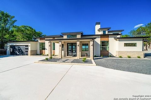 NEW CONSTRUCTION WITH VIEWS! This beautiful modern estate of ultimate exclusivity situated on 1.07 acres, boasts the most luxurious of amenities & sited in the prime Texas Hill Country. Large walls of glass bathing the expansive open-plan living area...