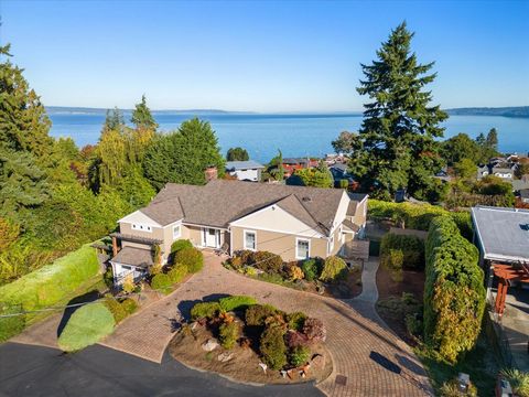 Welcome to your dream home in the coveted North Beach neighborhood of Seattle! Step inside to captivating and breathtaking views of the Puget Sound. The entertainer's kitchen is a chef's delight, featuring high-end appliances, ample counter space, an...