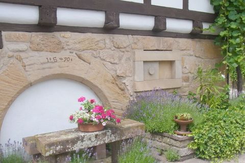 Our holiday apartment in a half-timbered house / built in 1570, surrounded by a picturesque garden with an adjacent chestnut forest, has been completed since 2016 and has been classified with four stars for 2 people since February 2019. In addition, ...