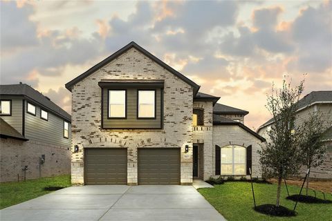 LONG LAKE NEW CONSTRUCTION - Welcome home to 18423 Windy Knoll Way located in the community of Grand Oaks and zoned to Cypress-Fairbanks ISD. This floor plan features 4 bedrooms, 2 full baths, 1 half bath, and an attached 2-car garage. You don't want...
