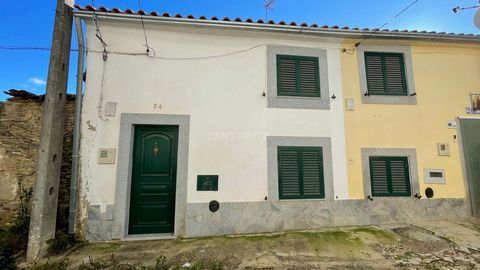 House T3 with two floors of old construction, total area of 66m2. R/C: living room, two bedrooms, a bathroom. 1st floor: kitchen with fireplace, one bedroom, one bathroom. Ready to move in, located in a quiet village, with service and public transpor...