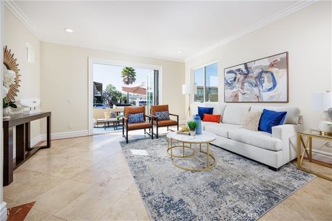 Nestled within the vibrant beach community, this exquisite three-story home offers not only luxurious amenities but also unparalleled convenience. Situated near Pacific City, Huntington Beach Pier, and an array of renowned restaurants and shopping de...