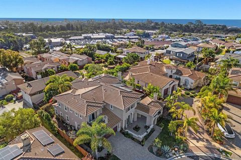 Price reduction! Listed at an exceptional price per sq/f in Encinitas at $707! Experience coastal luxury in this residence nestled near Moonlight Beach. Boasting nearly 4300 sq ft of modern construction on a spacious 0.2-acre lot. Step inside to disc...