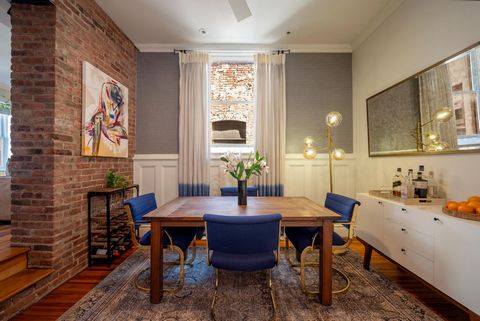 Situated in the Boniface Lofts, a converted condominium from a circa 1863 Gothic-styled church building, this triplex residence features 1,450sf of generous townhouse-like living space including 2 bedrooms, loft, 2.5 bathrooms, private roof deck, cen...