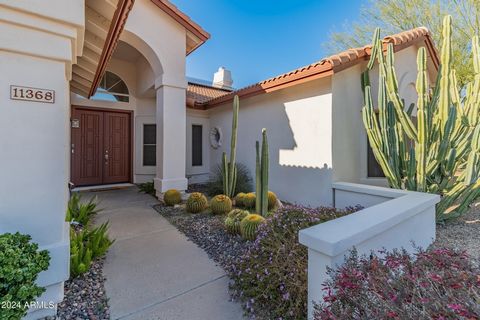 Welcome to your dream oasis nestled near the heart of Scottsdale Mountain. This exquisite single level home sits on a large corner view lot, offering unparalleled privacy and space for your family to thrive. Upon entering, you're greeted by the spaci...