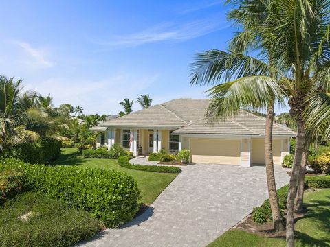 Luxury coastal living in gated enclave, steps from private deeded beach. Cul-de-sac home features exquisite landscaping, paver driveway & inviting French doors. Inside, seamless floor plan unfolds w/dining rm featuring gas fireplace, living/music rm,...