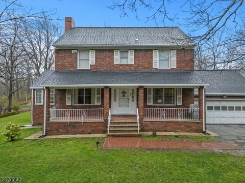 If you are looking for a dream home with a stunning view easy to commute to NYC, look no further than this beautifully brick colonial home. This property offers a rare combination of location and privacy. You will have a front porch, spacious yard an...