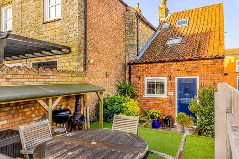 A rare chance to purchase a charming and refurbished, two-bedroom period cottage, nestling between other historic properties in a conservation area in the heart of the much sought after Lincolnshire Cliff village of Navenby. Built of traditional bric...