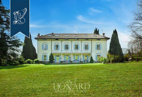 This elegant Art-Nouveau villa is for sale near Lake Como. This majestic property has several levels, for a total of 1,100 sqm, and is surrounded by a 2-hectare park with a refined Italian garden and a brand-new swimming pool. The facade of this maje...