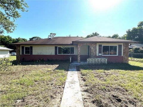 INVESTMENT PROPERTY! Solid concrete block home located in Silver Springs Shores features 3 bedrooms, 2 full bathrooms with 1,954 heated sq ft so this home is LARGE! Various living spaces in the home give your family all the space you need. No applian...