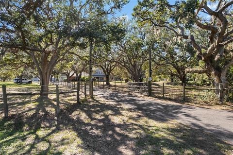 TWO SINGLE FAMILY HOMES ON 5 ACRES WITH A BARN!! Welcome to the exclusive Fox Creek II community, where this exceptional 5-acre family compound awaits you. Situated at the end of a peaceful cul-de-sac, this private 5-acre lot is fully fenced and feat...