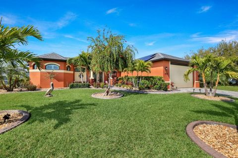 Immerse yourself in Florida living with this exquisite turnkey Gulf-access waterfront SMART home located in Port Charlotte. Enjoy breathtaking sunset views from your heated custom pool/spa, boasting 153 feet of water frontage on a tip lot. This metic...