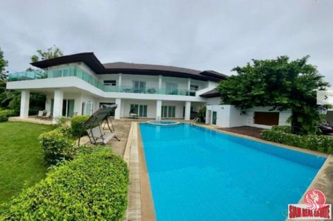 Windmill Village is a luxurious pool villa located offering an abundance of natural light and a serene atmosphere with stunning views overlooking the picturesque Windmill Golf Course. This exquisite villa features 7 bedrooms, 7 bathrooms, and a gener...