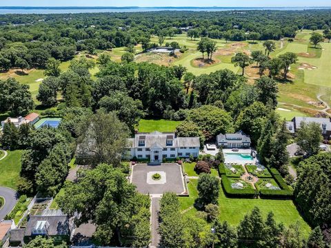 Nestled within the serene and secluded enclave of Hilltop Place in Rye, stands a magnificent property once the country retreat of Andrew Goodman, the former owner of Bergdorf Goodman. A true embodiment of 1920s elegance, this captivating Colonial mas...