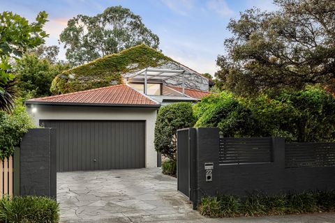 A spectacularly proportioned family classic, architecturally designed to create soothing connections to its lush, Rick Eckersley-designed gardens, this four-to-five bedroom, three bathroom residence is peacefully nestled in a coveted Sunnyside Estate...