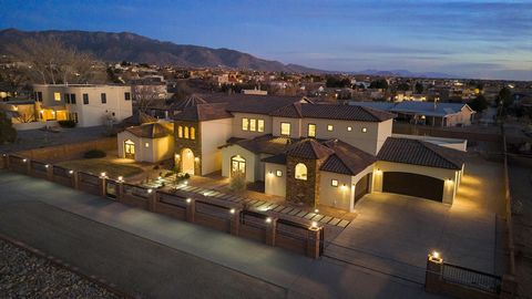 Welcome to one of the most luxurious homes in Albuquerque. This stunning 6420 sq ft custom built home nestled in the desirable North Albuquerque Acres. Constructed in 2017 this luxurious residence offers 5 spacious bedrooms, 6 elegantly appointed bat...