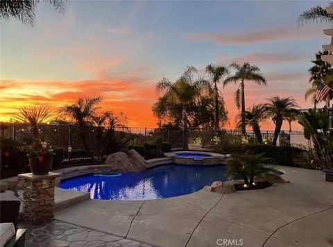 Fabulous Pool Home with Stunning Views. Spacious 5 Bedrooms, 2 ½ Bathrooms with a Loft. Kitchen is Light, Open & Bright with Granite Countertops and Breakfast Bar. Crown Molding, Baseboards, Recessed Lighting, High Ceilings, Separate Laundry Room. La...