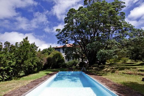 Surrounded by beautiful views, this modern cottage in Santo António da Serra features warm décor. It offers a peaceful refuge for a family or group of friends looking for an accommodation on the Island of Madeira. The cottage features a shared pool a...